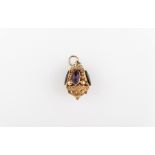 A yellow metal Etruscan style conical shape fob,