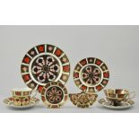 Royal Crown Derby "Imari" pattern trio, a cake plate, coffee can and saucer and two pin dishes, (8).