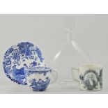 Royal Crown Derby tea cup and saucer, decorated in blue and white Oriental garden scene,