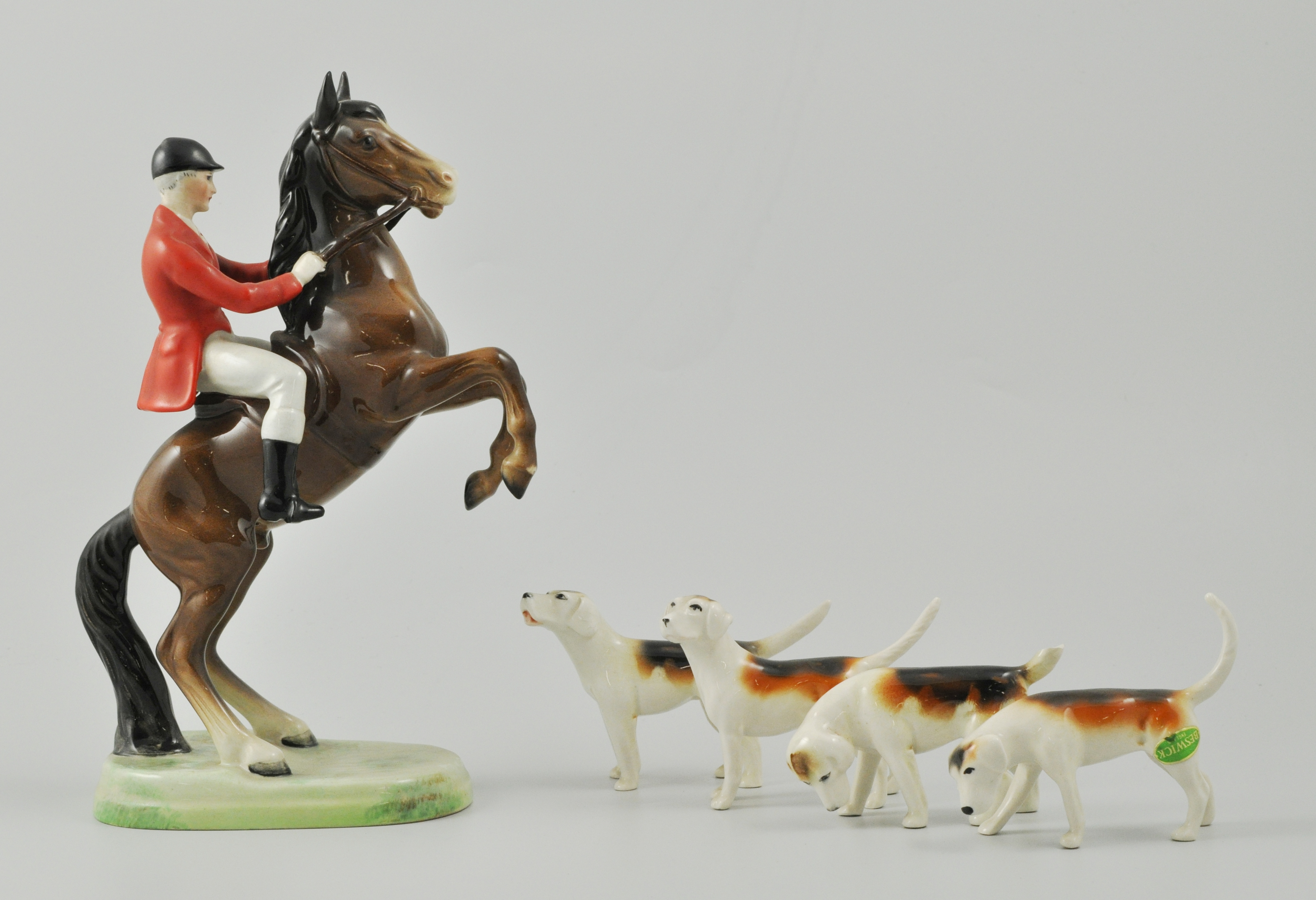 Beswick figure of a Huntsman on a rearing horse,