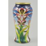 Miniature Moorcroft enamel vase, in original fitted box, decorated with Orchids,