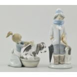 Lladro figure of a girl and dog, 12cm, together with another Lladro figure of a boy and dog, 20cm,