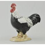 Beswick "Sussex" Cockerel, model No. 1899, black and white gloss, issued 1963-1971, height 18cm.