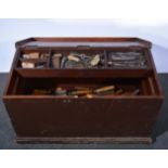 Painted pine carpenters chest containing a collection of carpenters tools including chisels,