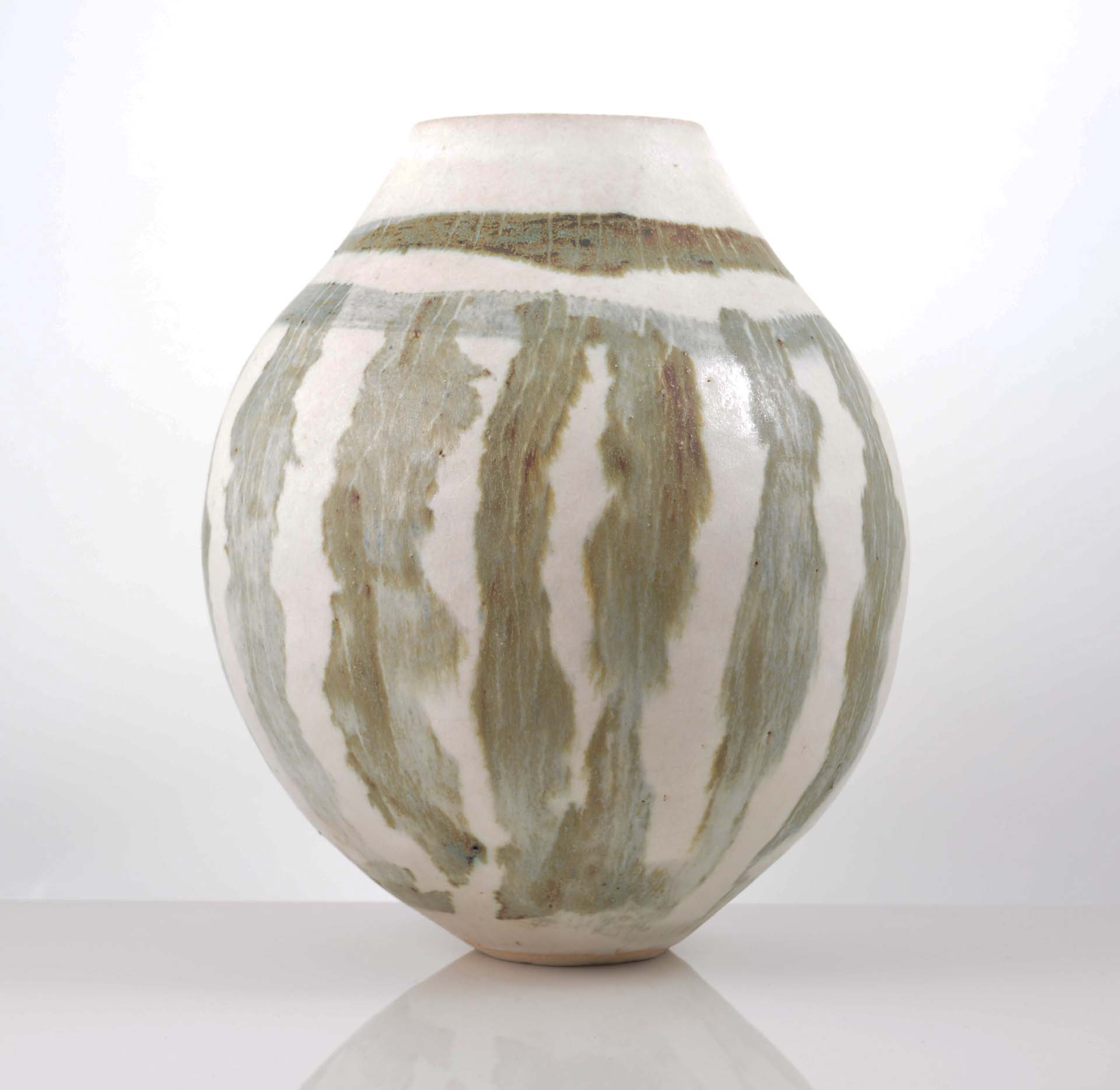 Studio pottery ovoid vase, white bodied with banding and striations, 27cm.