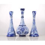 Pair of William Moorcroft for MacIntyre Florian ware candlesticks, 'Iris' design in blue colourway,