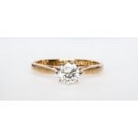 A diamond solitaire ring,