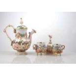 Capodimonte pottery coffee set, moulded and painted decoration of frolicking cherubs,