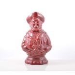 Red glazed pottery figure Wemyss style, The Sailor, 28cm and a Wemyss style model of a pig, (2).