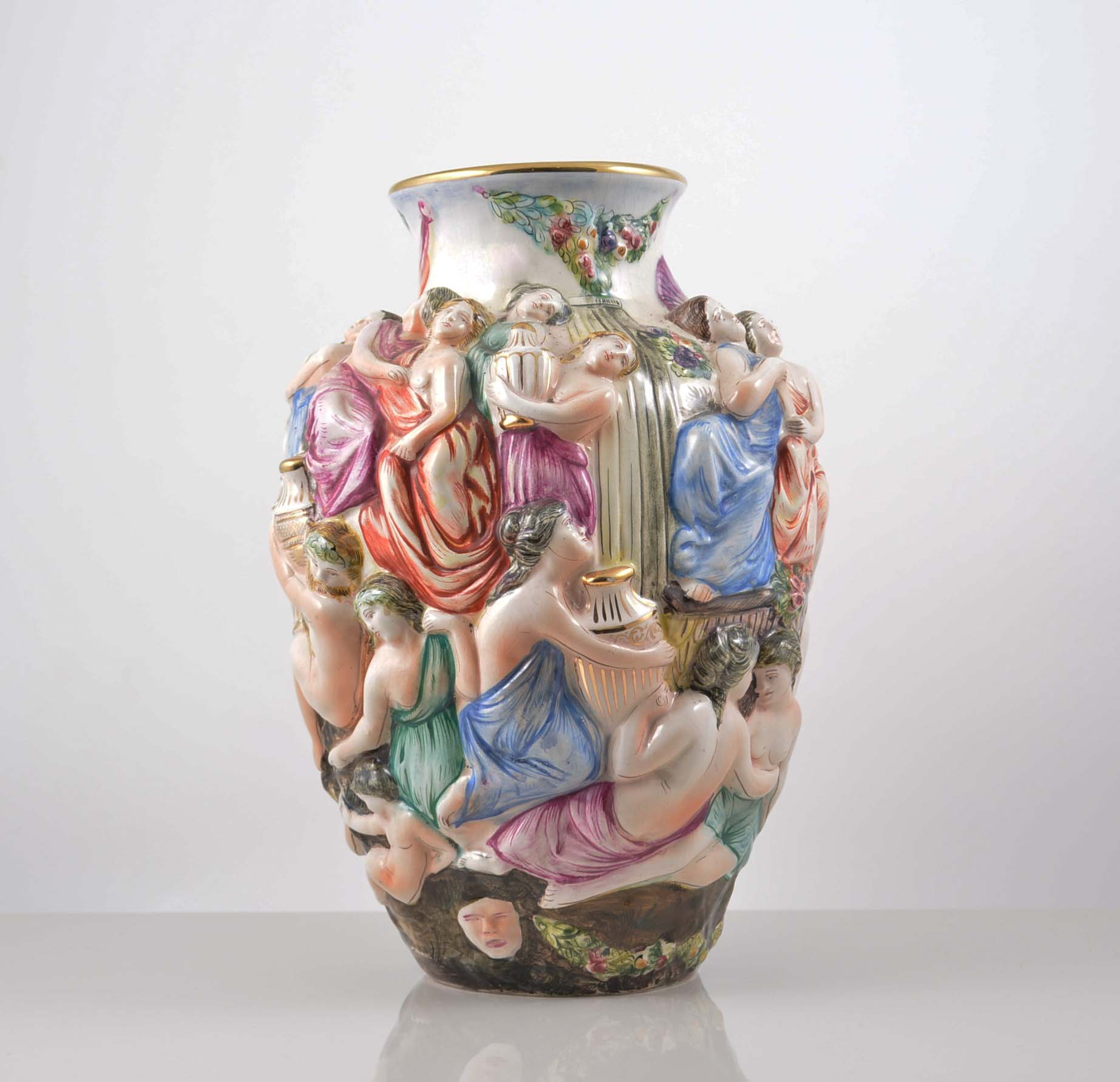 Capodimonte vase, decorated in relief with classical figures, 30cm.