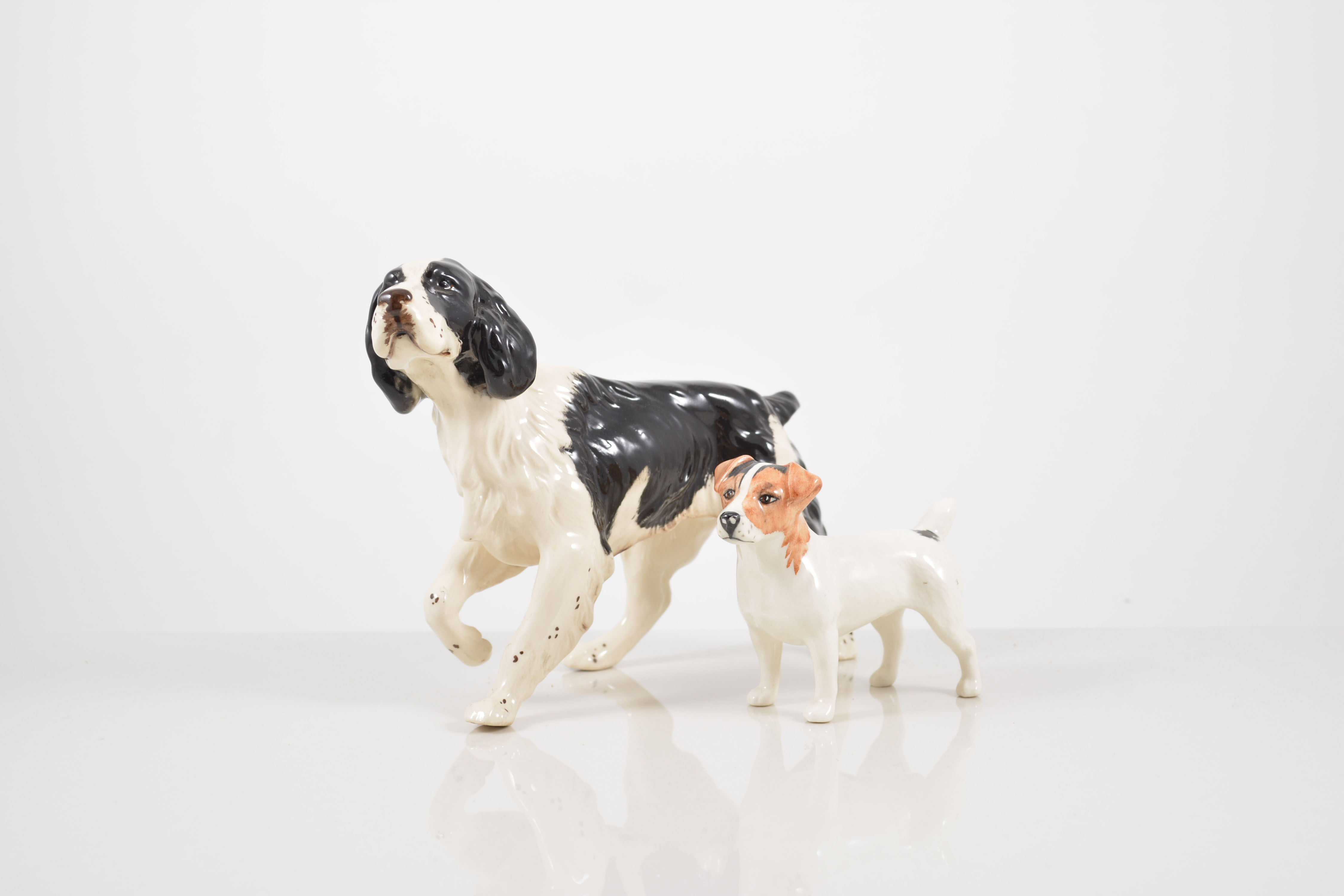 A group of nine Beswick dog models, including Cairn Terrier 3082, Afghan running 3070,