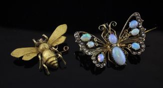 Two early 20th century gold and gem set bug brooches, one modelled as bee with cabochon garnet eyes,