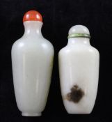 Two Chinese jade baluster snuff bottles, 1760-1900, the first of pale celadon stone with a