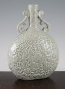 A Chinese moulded and celadon glazed moonflask, Yongzheng mark but later, relief decorated to each