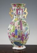 A Chinese Canton-decorated famille rose two handled vase, Jiaqing / Daoguang period, of flattened