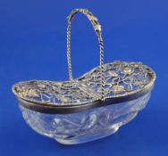 A George V pierced silver mounted glass pot pourri basket by William Comyns, of ovoid form, with two