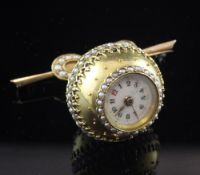 An early 20th century gold and split pearl set globe fob watch, with Arabic dial, suspended from a