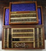 A late Victorian mahogany cased optometrist set by Pickard & Curry, fitted with various lenses,