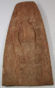 A Papua New Guinea Sepik River large wooden storyboard, relief-carved and incised with a central