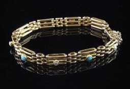 An Edwardian 15ct gold, turquoise and seed pearl set gate link bracelet, with safety chain, gross