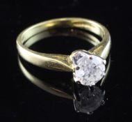 An 18ct gold and solitaire diamond ring, the round brilliant cut diamond weighing approximately 0.