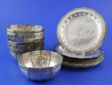 Two set's of three late 19th/early 20th century North Indian do-decagonal silver bowls, with