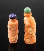 Two Chinese coral snuff bottles, late 19th / early 20th century, the first carved in relief with