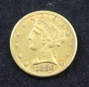 A US 1886 five dollar gold coin.