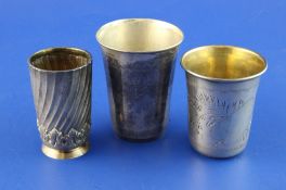 A late 19th century Russian 84 zolotnik silver tumbler, with wrythened body, assay master, Alexander