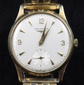 A gentleman's 9ct gold Longines manual wind wrist watch, with baton and quarterly Arabic numerals