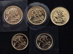 Three gold full sovereigns, 2000, 2001 & 2004 and two gold half sovereigns, 2001 & 2004.