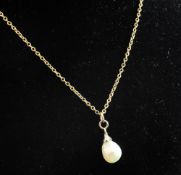 A Victorian baroque pearl pendant with rose cut diamond set mount, 0.5in, on a later fine link