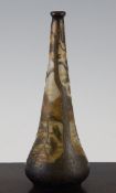A Devez cameo glass bottle vase, c.1900, overlaid and acid etched with a mountainous lakeside scene,