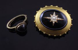 A cased Victorian gold, cabochon banded agate and seed pearl set pendant locket brooch, with