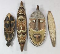 A Papua New Guinea Sepik River wooden ancestor board, with stylised face carving and polychrome
