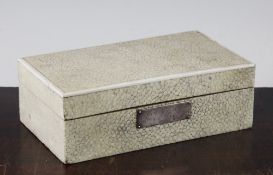 An Art Deco rectangular pale green shagreen and ivory mounted box, mounted with rectangular silver