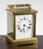 An early 20th century gilt brass carriage clock, with movement striking on a gong, 5.25in.