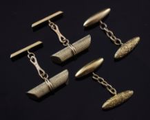 A pair of Italian engine turned 18ct gold baton shaped cufflinks and a pair of 18ct gold torpedo