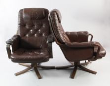 A pair of brown leather buttoned swivel armchairs, on bentwood bases, possibly retailed by Heals