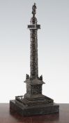 A late 19th / early 20th century bronze model of The Vendome Column, on a square polished slate