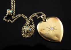 A Victorian 9ct gold muff chain with turquoise set spherical spacers together with a diamond set