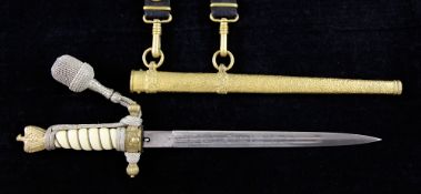 A Third Reich naval dagger by Carl Eickhorn, Solingen, with etched blade, gilt scabbard and