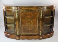A Victorian walnut marquetry inlaid and ormolu mounted credenza, with central cupboard door
