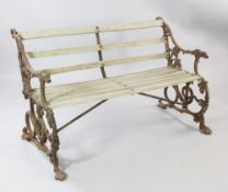 A Victorian Coalbrookdale cast iron grape and serpent garden bench, the open arms with dog head