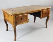 A 19th century French provincial kneehole desk, with two frieze drawers, on scroll legs, 4ft 9in.