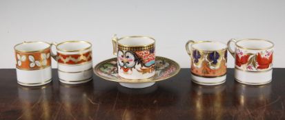 Five Worcester gilt and polychrome porcelain coffee cans and a saucer, c.1800-1820, comprising a