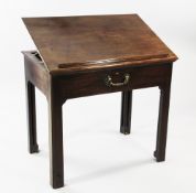 A George III mahogany architect's table, with hinged top, single frieze drawer and fitted