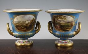 A pair of Copeland and Garrett gilt and turquoise porcelain campana urns, c.1840, decorated with