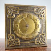 Margaret Gilmour (1860-1942). A Scottish Arts & Crafts brass 'wag at the wa' wall clock, embossed