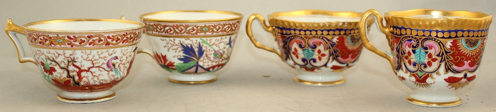 the two cups and a saucer decorated in polychrome enamels, one cup and saucer with a figure in a - Image 7 of 8